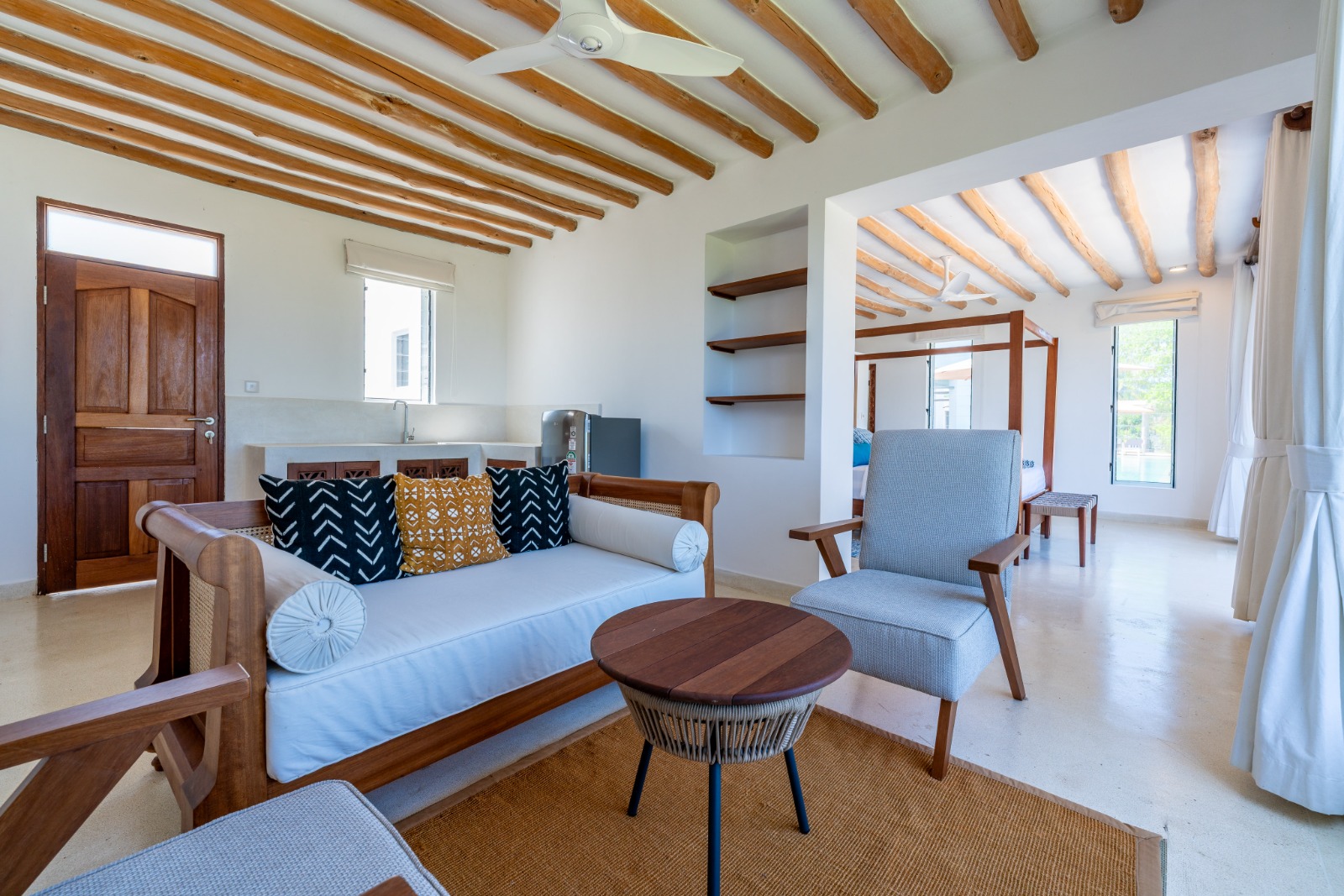 Villa suite lounge with wooden furniture
